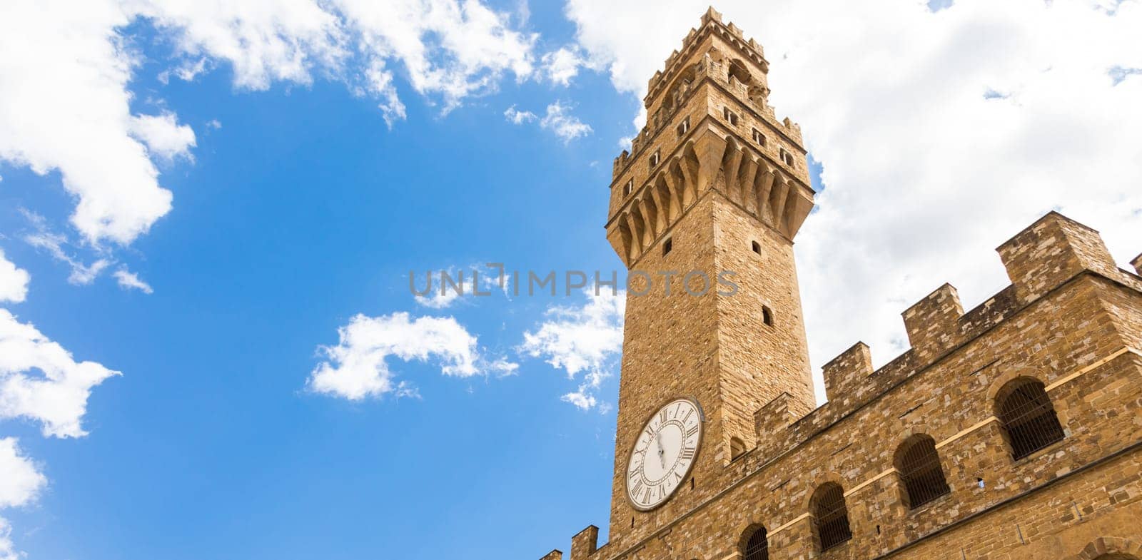 Florence, Italy. The Old Palace tower - named Palazzo Vecchio - with blue sky. Copy space, nobody.