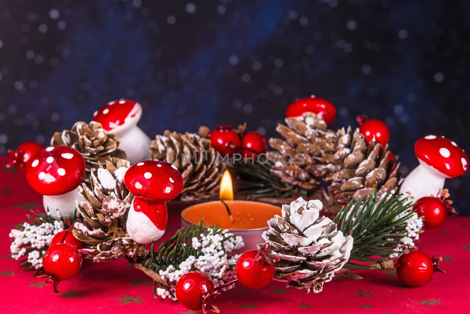 advent wreath with burning candle