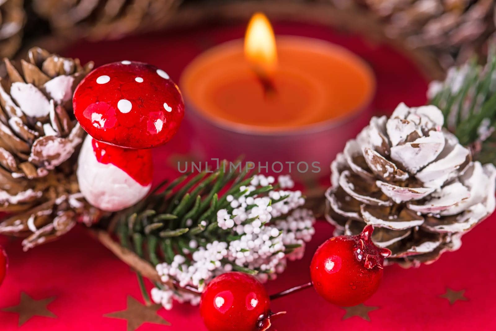 advent wreath with burning candle