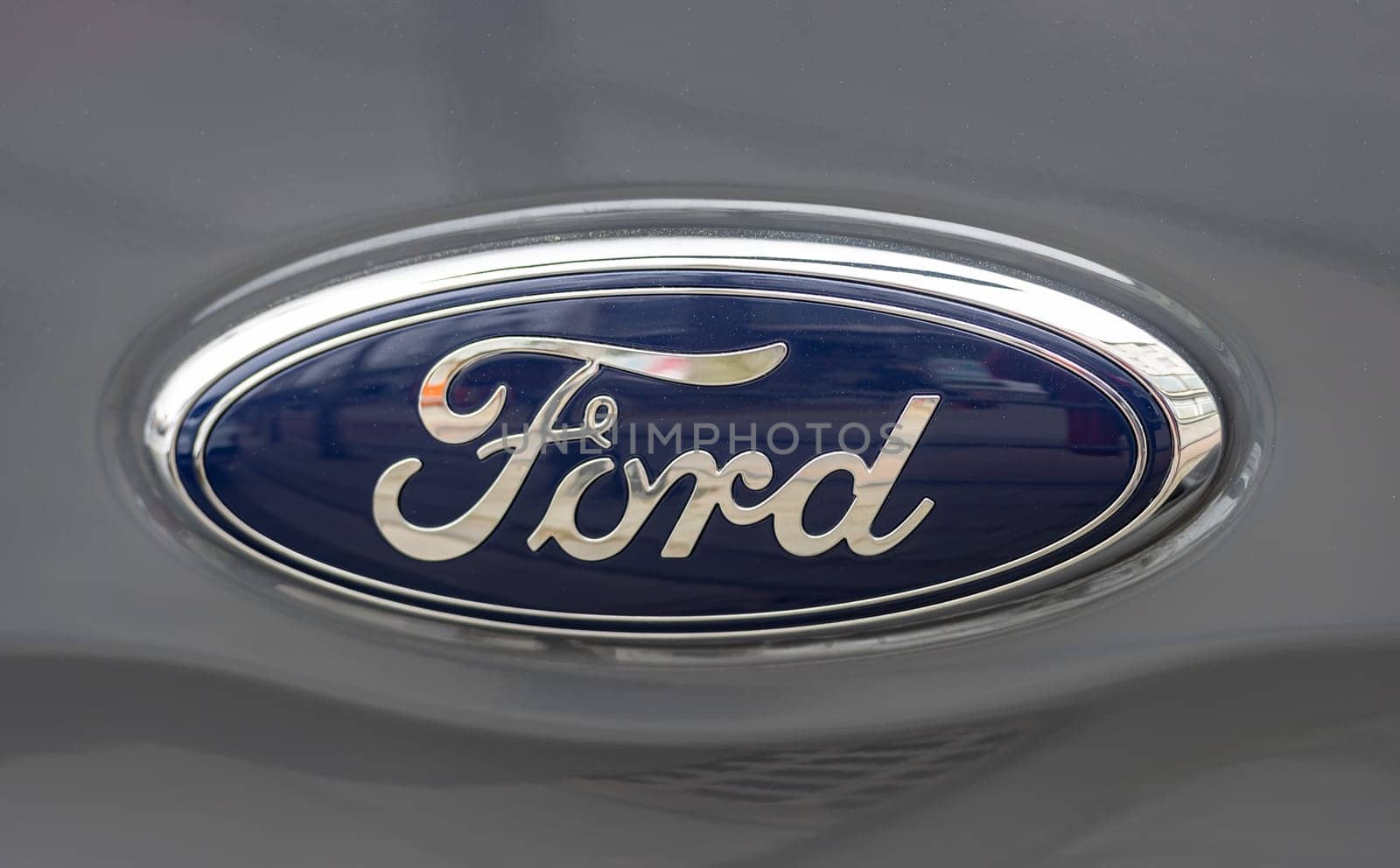 WETZLAR, GERMANY 2022-04-23: Ford logo on front of a car. Ford is an American multinational automaker that has its main headquarters in Detroit.