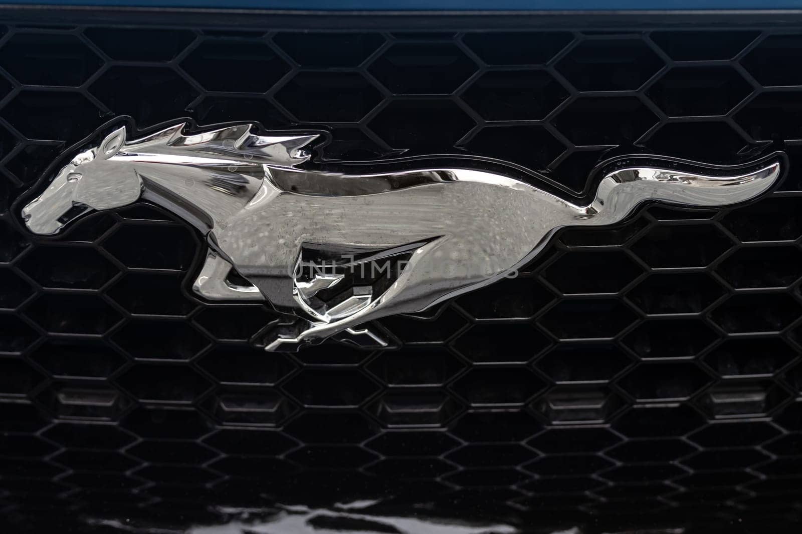 WETZLAR, GERMANY 2022-04-23: Ford logo on front of a car. Ford is an American multinational automaker that has its main headquarters in Detroit.