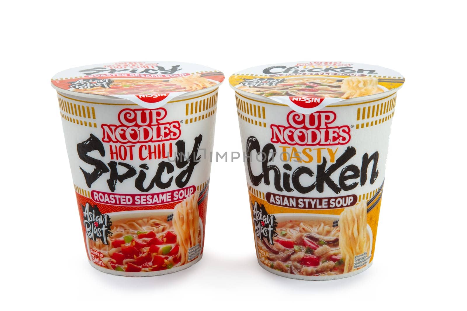 WETZLAR, GERMANY 2022-07-25: Tasty Nissin Chicken Cup Noodles - Asia Style. Unopened containers of Nissin Cup Noodles.
