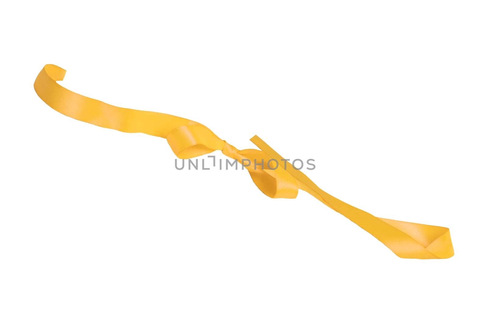 Gift bows. Closeup of a decorative yellow ribbon bow made of silk for gift box isolated on a white background. Decorations background. Macro photograph.