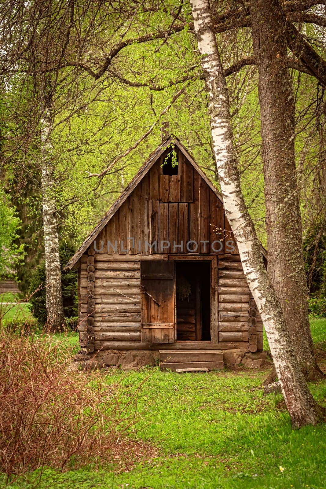 Old wooden bathhouse in the rural area....