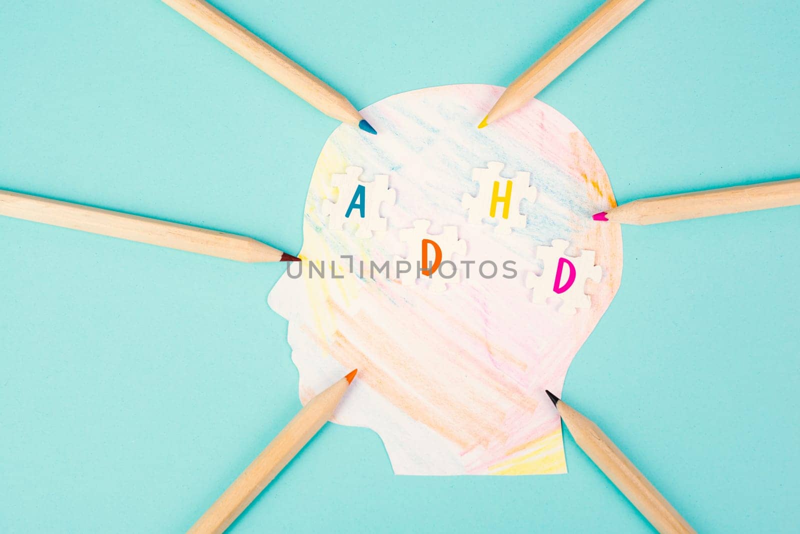 ADHD, attention deficit hyperactivity disorder, mental health, colored paper with pencils