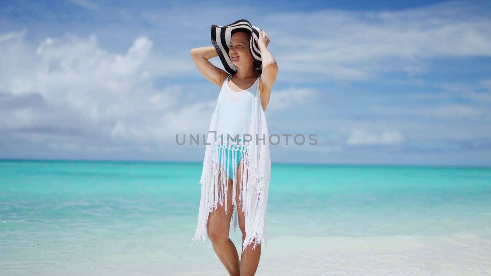 Beach Lifestyle And Ocean Water. Young Girl On Summer Vacation