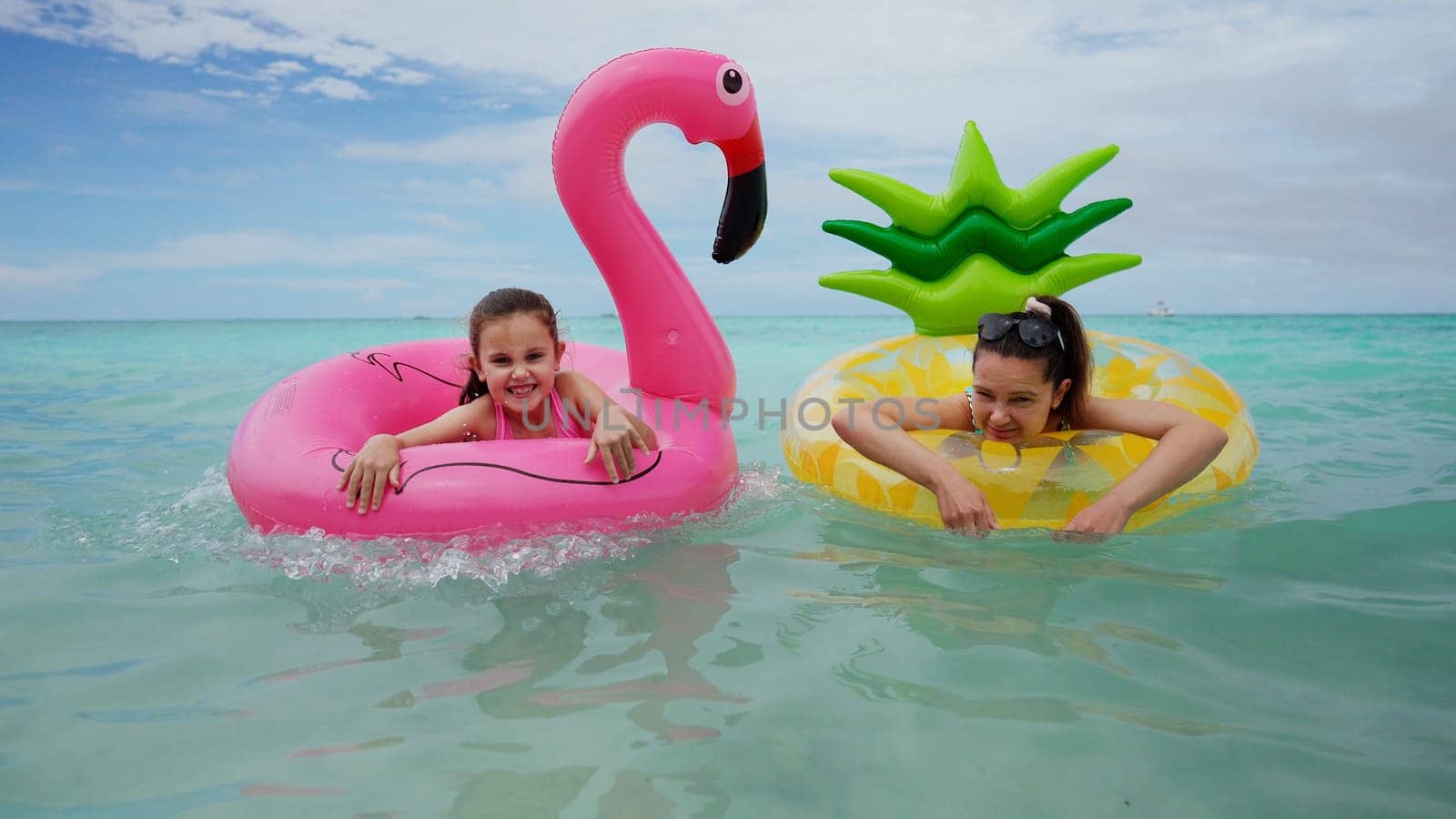 Fun Family Travel With Child. Water Relaxation In Water