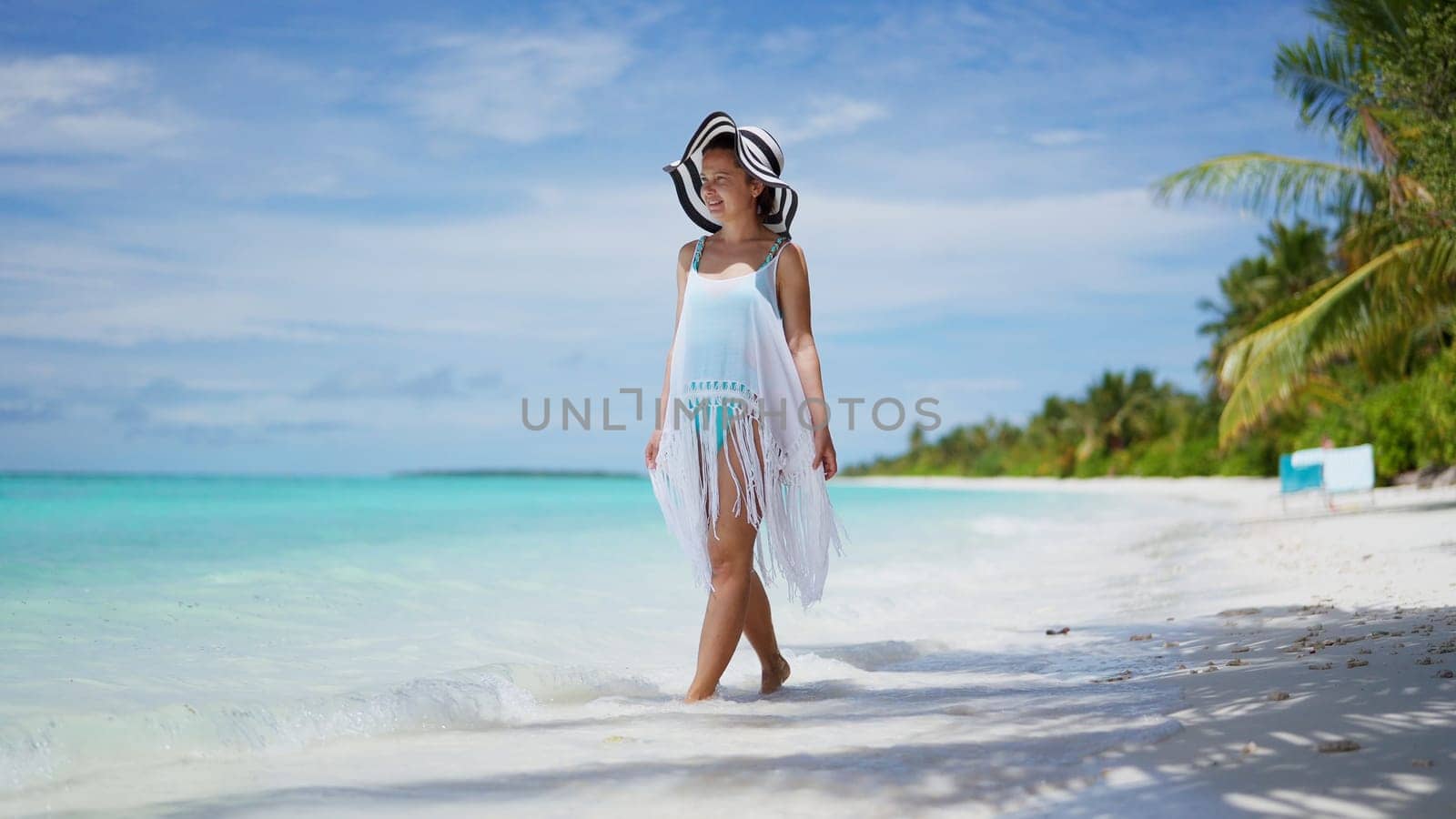Beach Lifestyle And Ocean Water. Young Girl On Summer Vacation