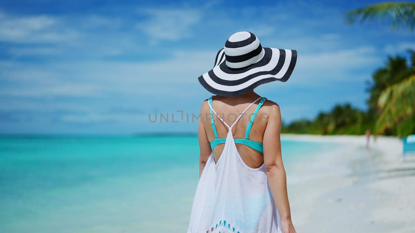 Beach Lifestyle And Ocean Water. Young Girl On Summer Vacation