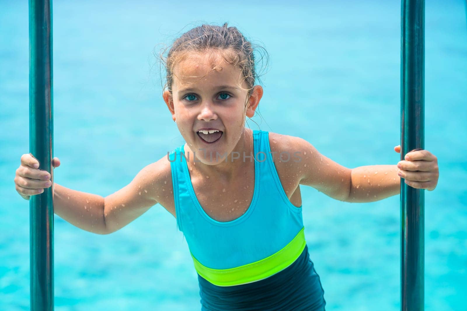 Tropical Travel And Swimming Sport. Ladder In Water