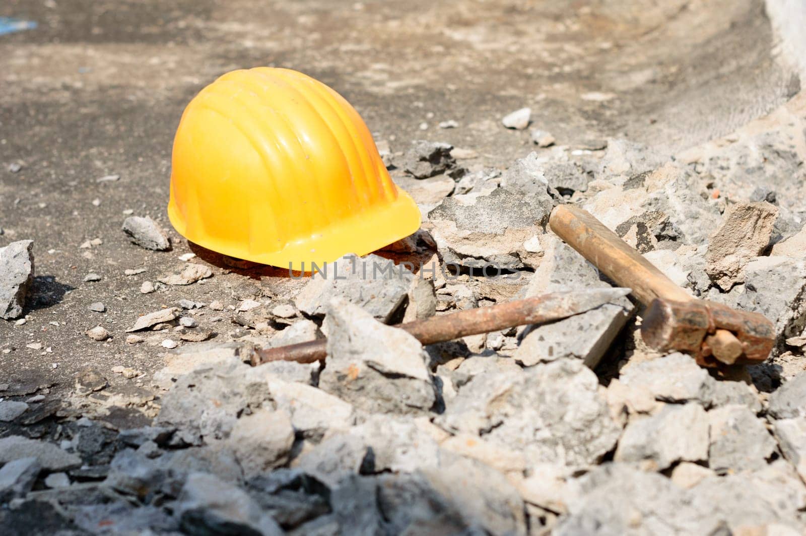 Safety Helmet in Construction Site. Yellow Hat. Safety Precautions Measures in Industrial workplace Background Concepts.