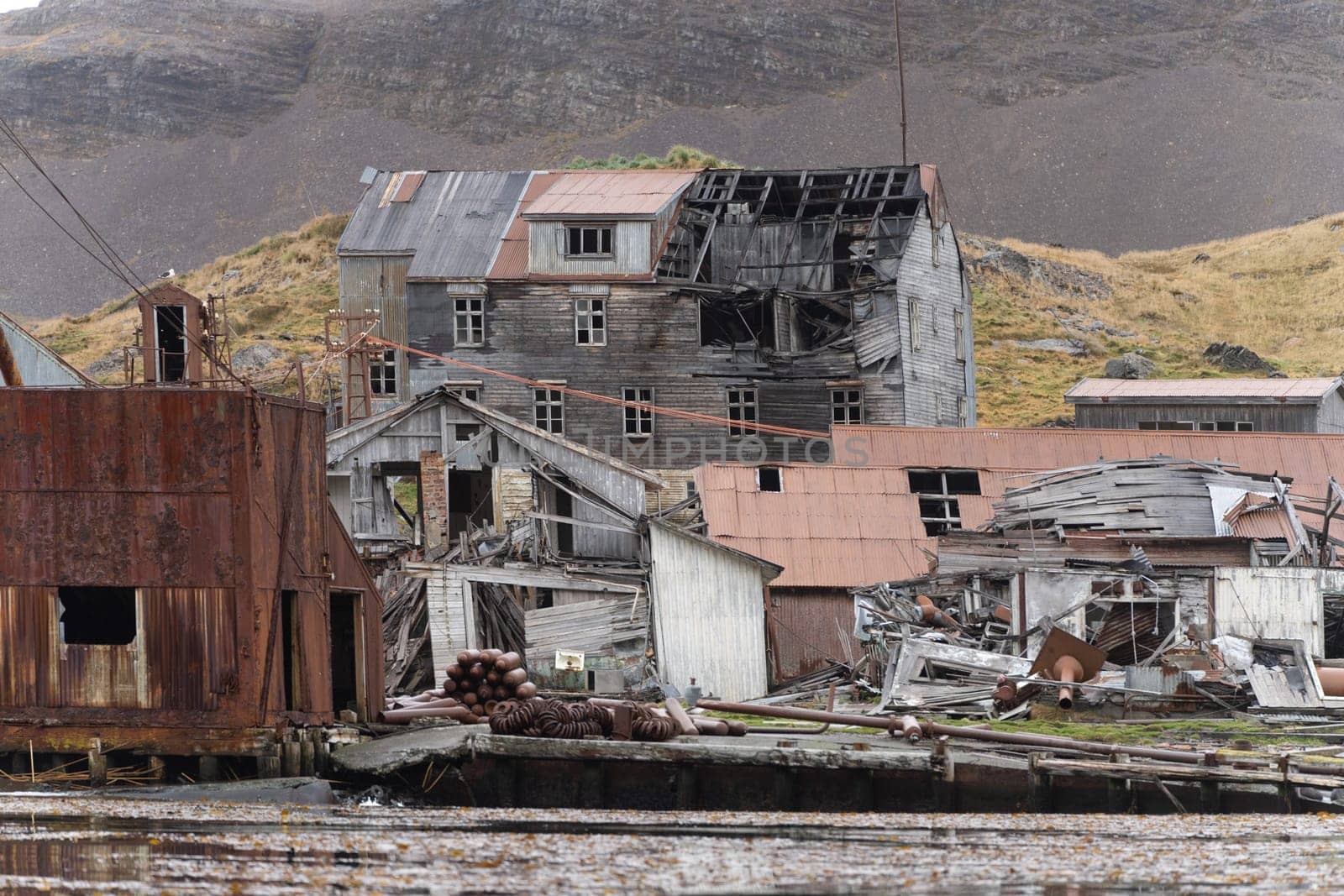 Leith Harbour - old, abandoned and largest of all seven whaling stations on South Georgia - whaling base in Leith Harbour on the north coast of South Georgia. Leith Harbour was a whaling base in Leith Harbour on the north coast of South Georgia, built and operated by Christian Salvesen & Company, Edinburgh. The base was in use from 1909 to 1965 and was the largest of seven whaling stations on South Georgia. It was located in Stromness Bay near its entrance on the shore of a glacial creek. William Storm Harrison was prominently involved in the foundation.