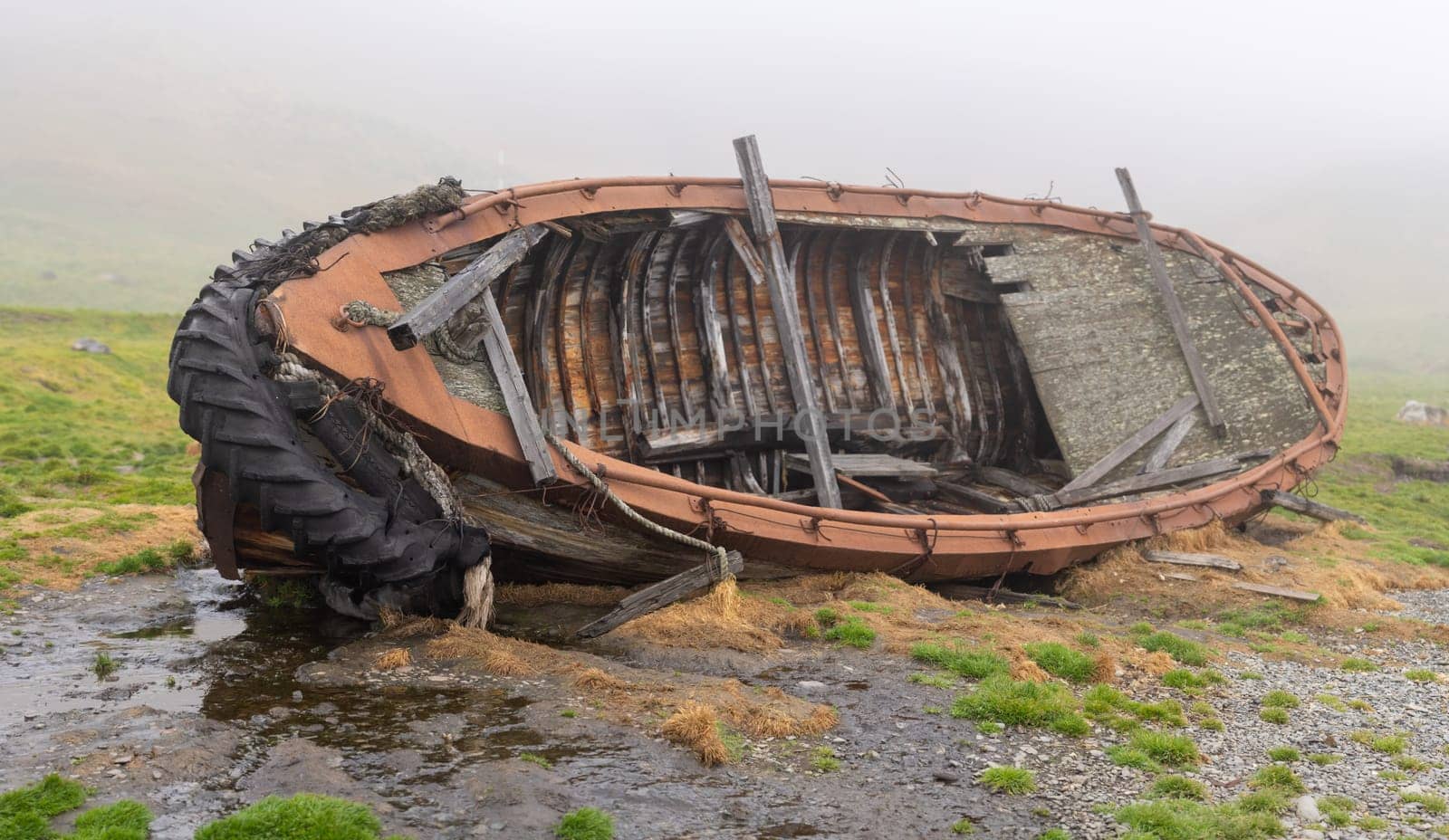 Wrecks of old whaling boats in Grytviken South Georgia in fog