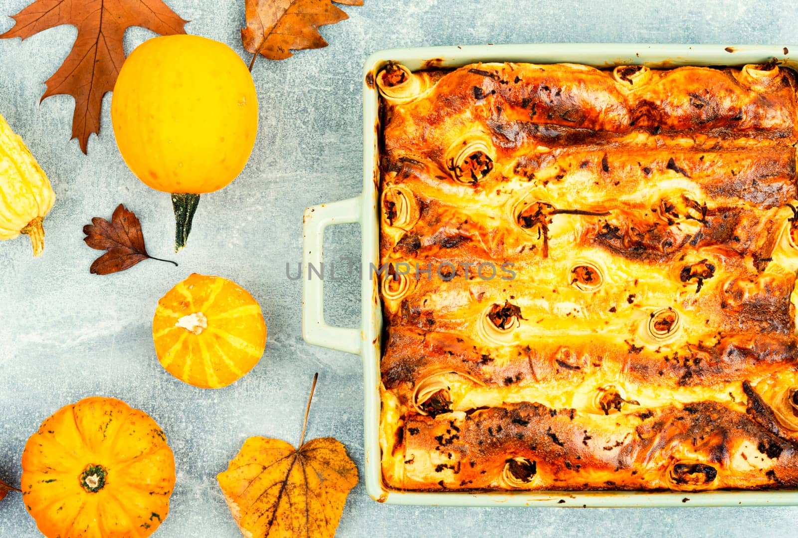 Autumn pie made from pumpkin, pita bread and cheese. Delicious seasonal pastries