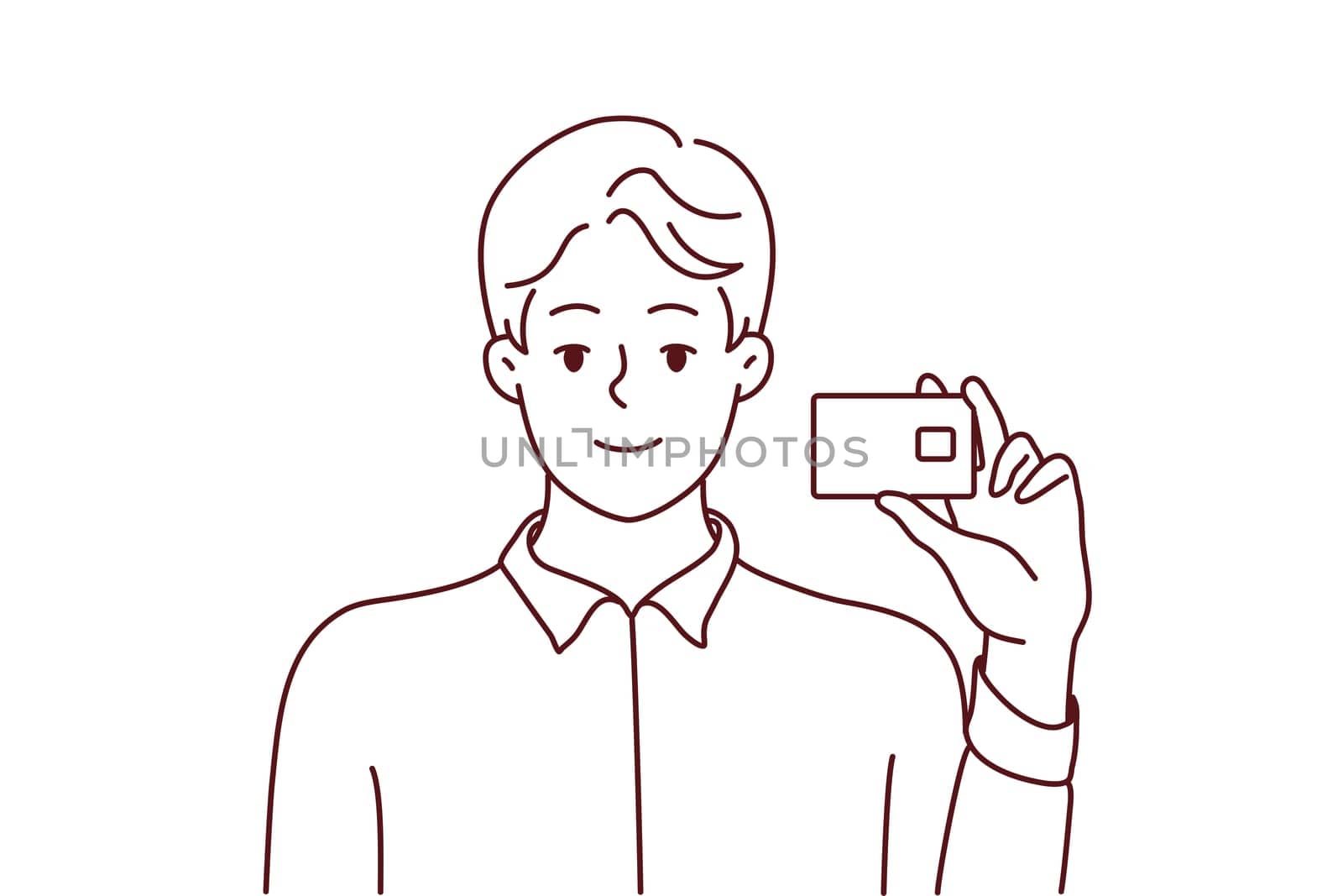 Smiling man posing with bank card
