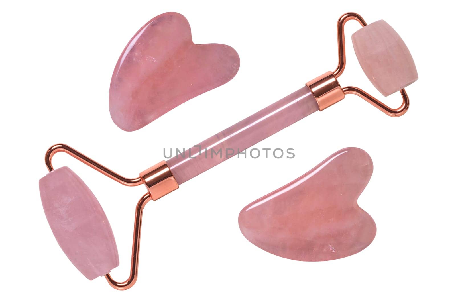 Gua Sha massage tools. Close-up of a pink jade facial roller or beauty roller and Rose quartz stones for better blood circulation and muscle activation. Clipping path. Beauty concept. Isolated on white.