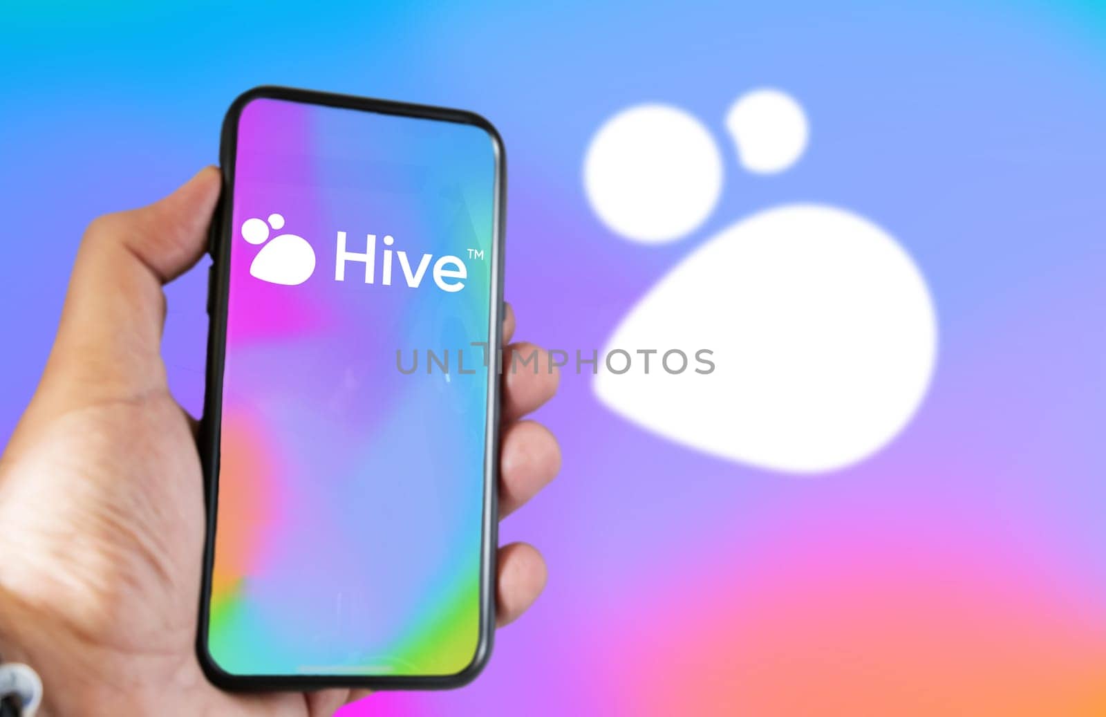 San Francisco, US, Nov 2022: hand holding a phone with Hive Social mobile app on screen. Hive is a social media platform