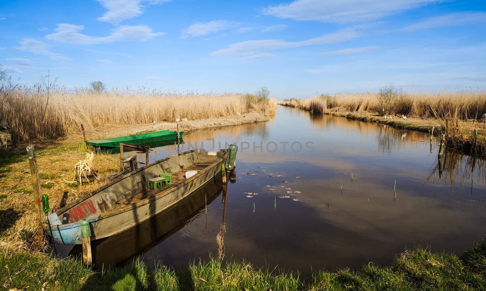 Old boat at canal on Lake Neusiedlersee