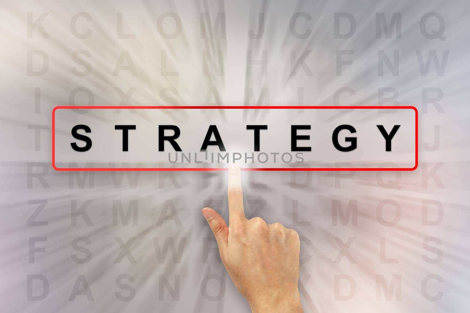 hand clicking business strategy on word search puzzle