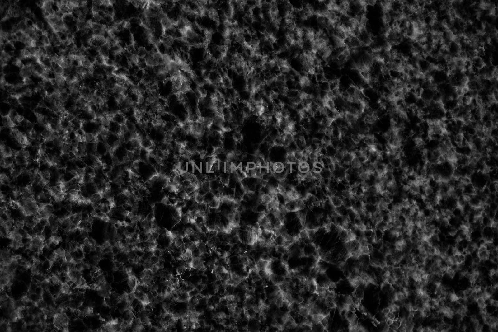 Black adstract backgound marble textured glow