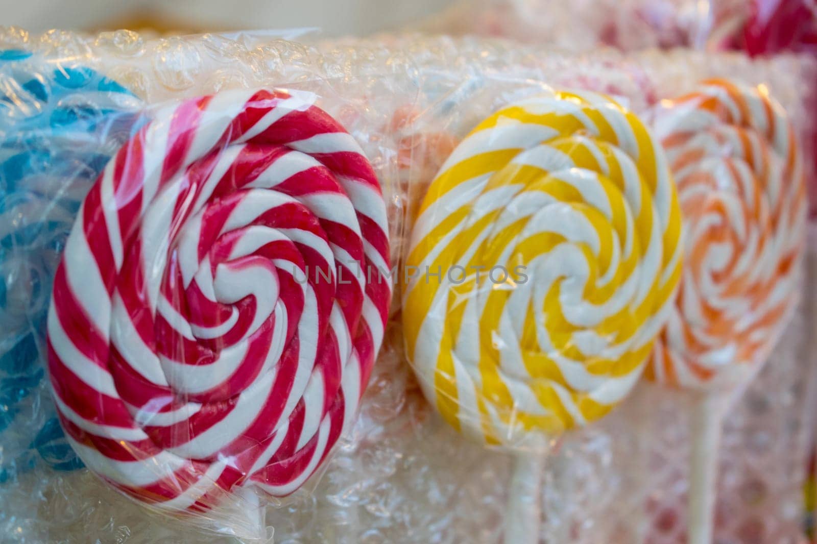 A group of multicolored lollipop close up