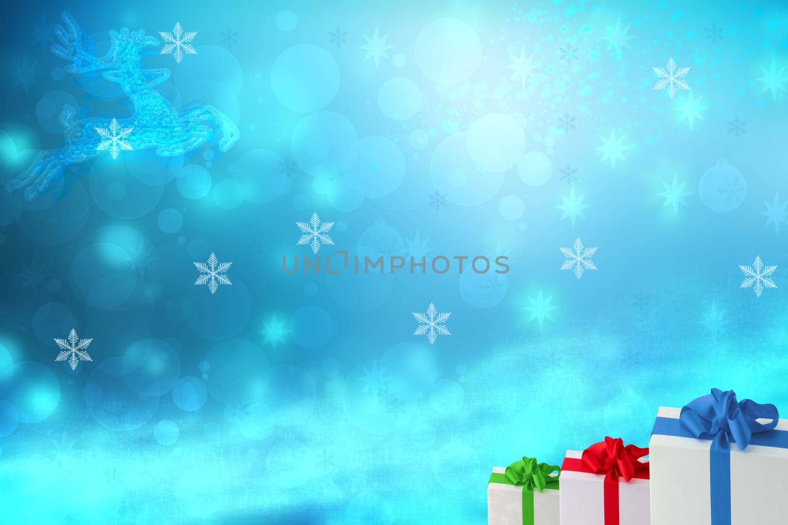 Christmas background. Three xmas gift boxes over abstract natural light blue winter landscape texture with stars, snow and bokeh stag. Beautiful card design. Space.
