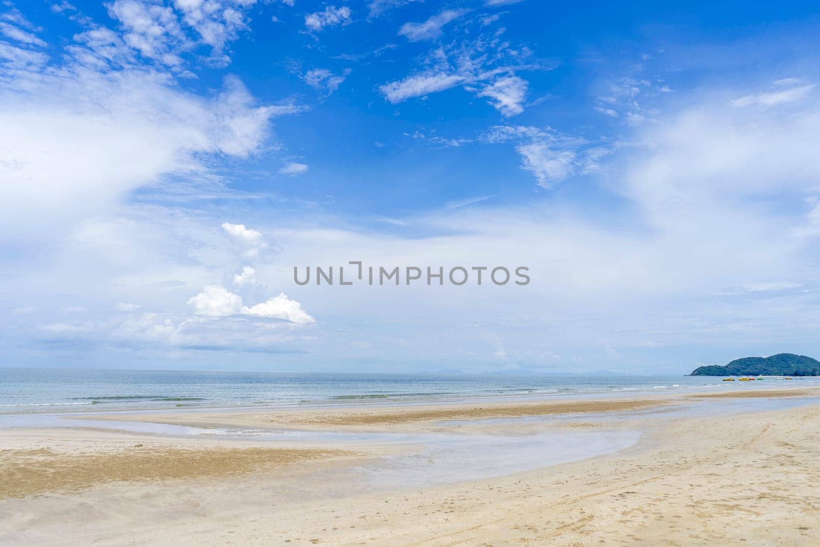 Beach sea mountain and blue sky cloud