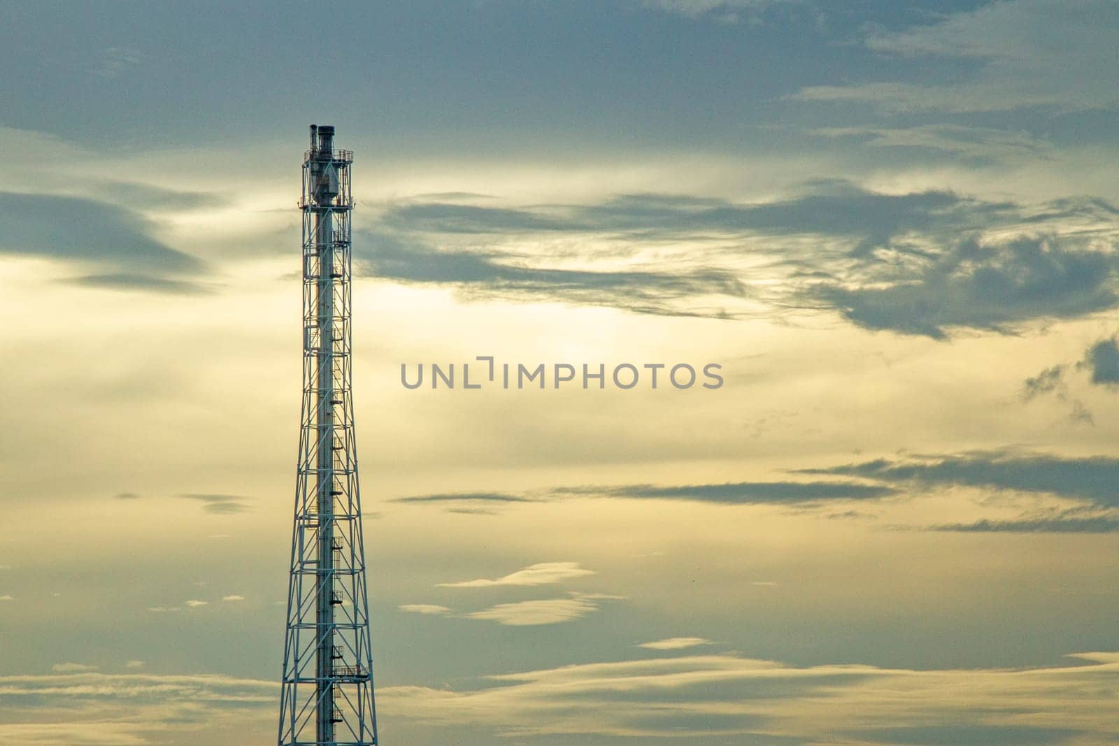 Flue gas in petroleum refinery  on everning