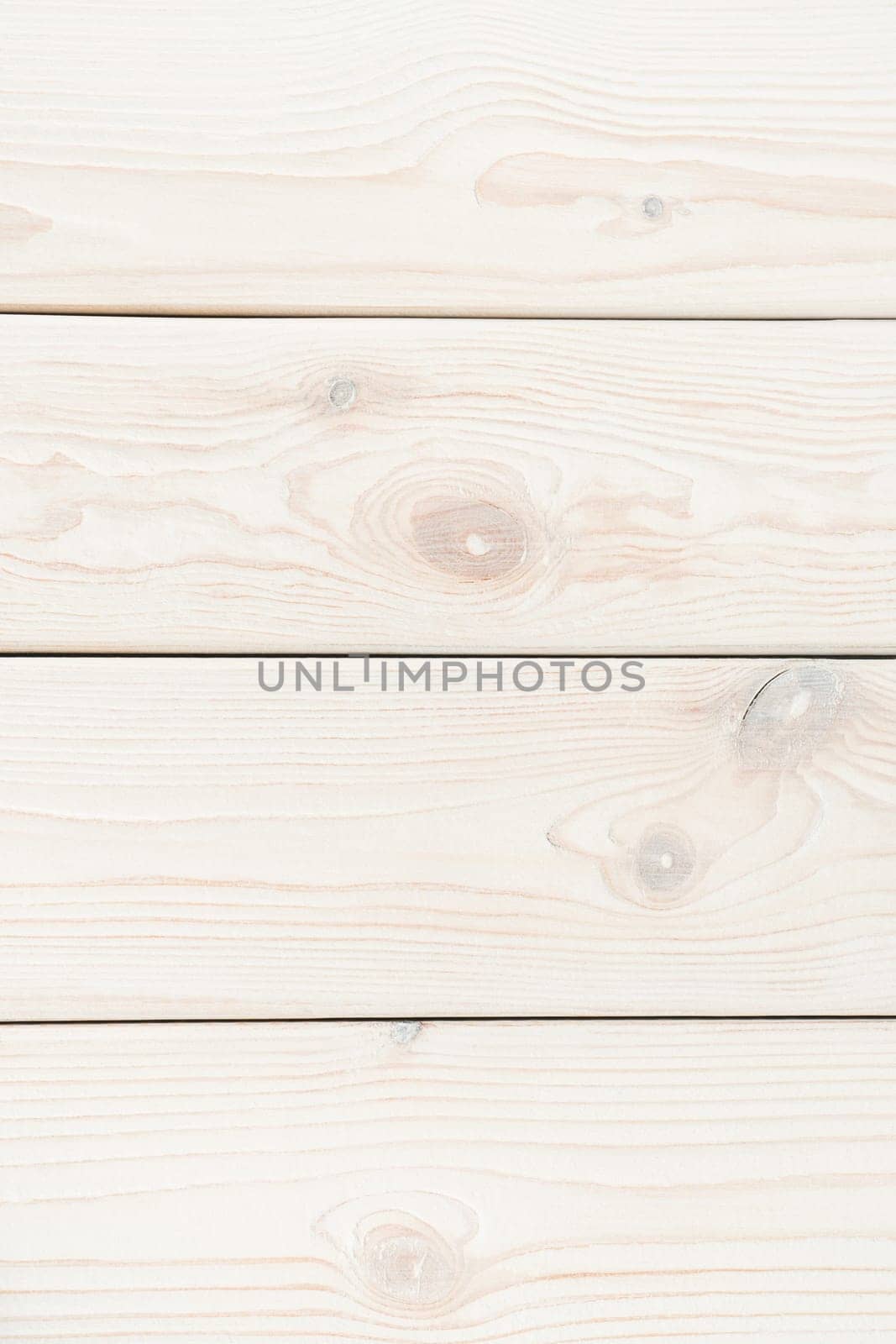 White striped planking. Wooden plank background for design and decoration. Copy space. Place for text. Light hardwood material. Horisontal row of floorboards. Wooden textured, natural tree. Vertical