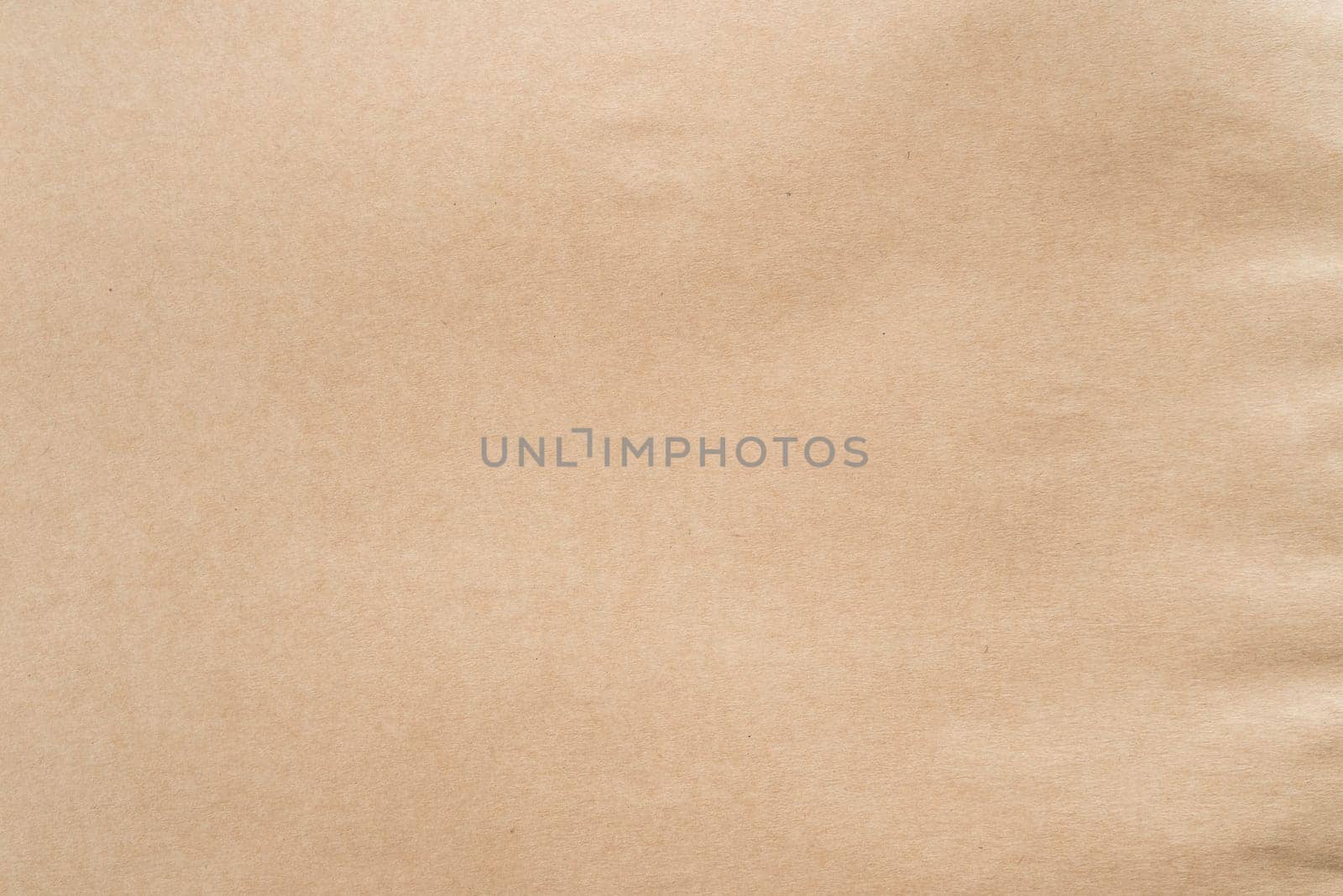 Beige packaging paper. Ecological production, canvas texture, recycling and zero waste technology. Sustainable resource, eco friendly. Degradable material and environment care. Full frame, copy space