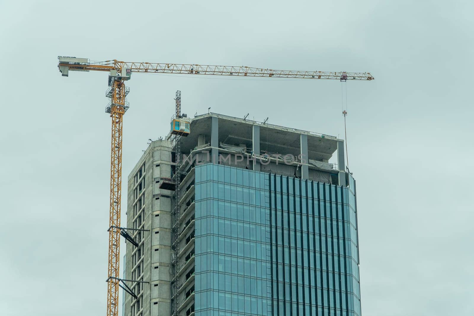 Building site with cranes and blue sky