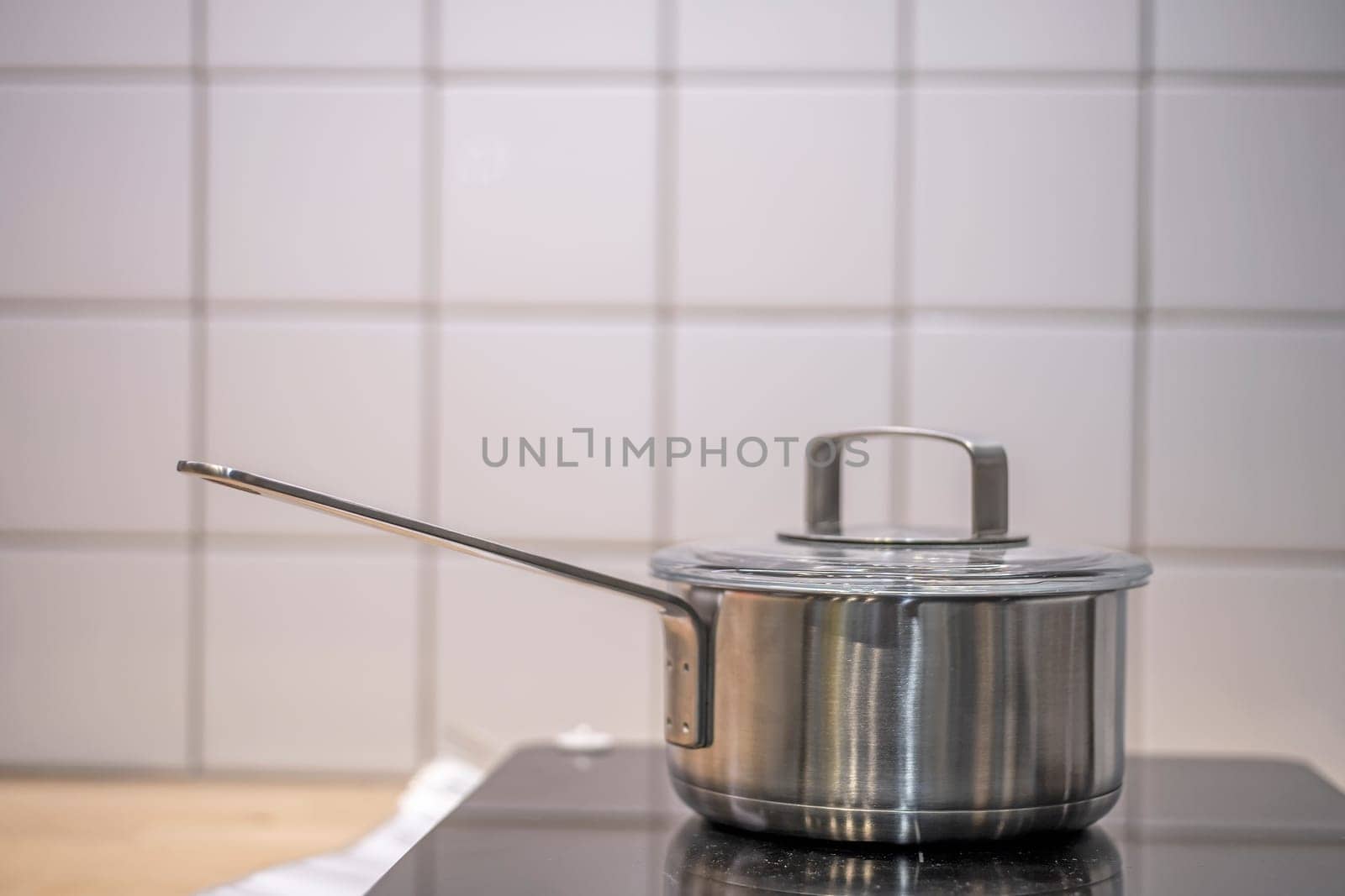 The pot is on the electric stove