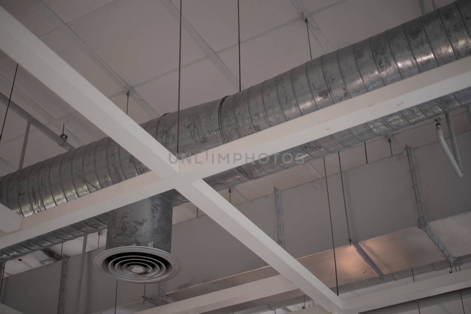 Air duct conditioning ceiling in the building