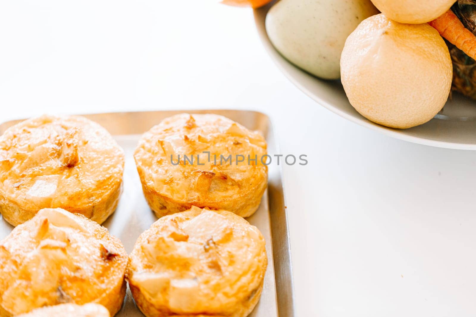 breakfast with with mini apple pies and fresh fruits. typical Italian breakfast