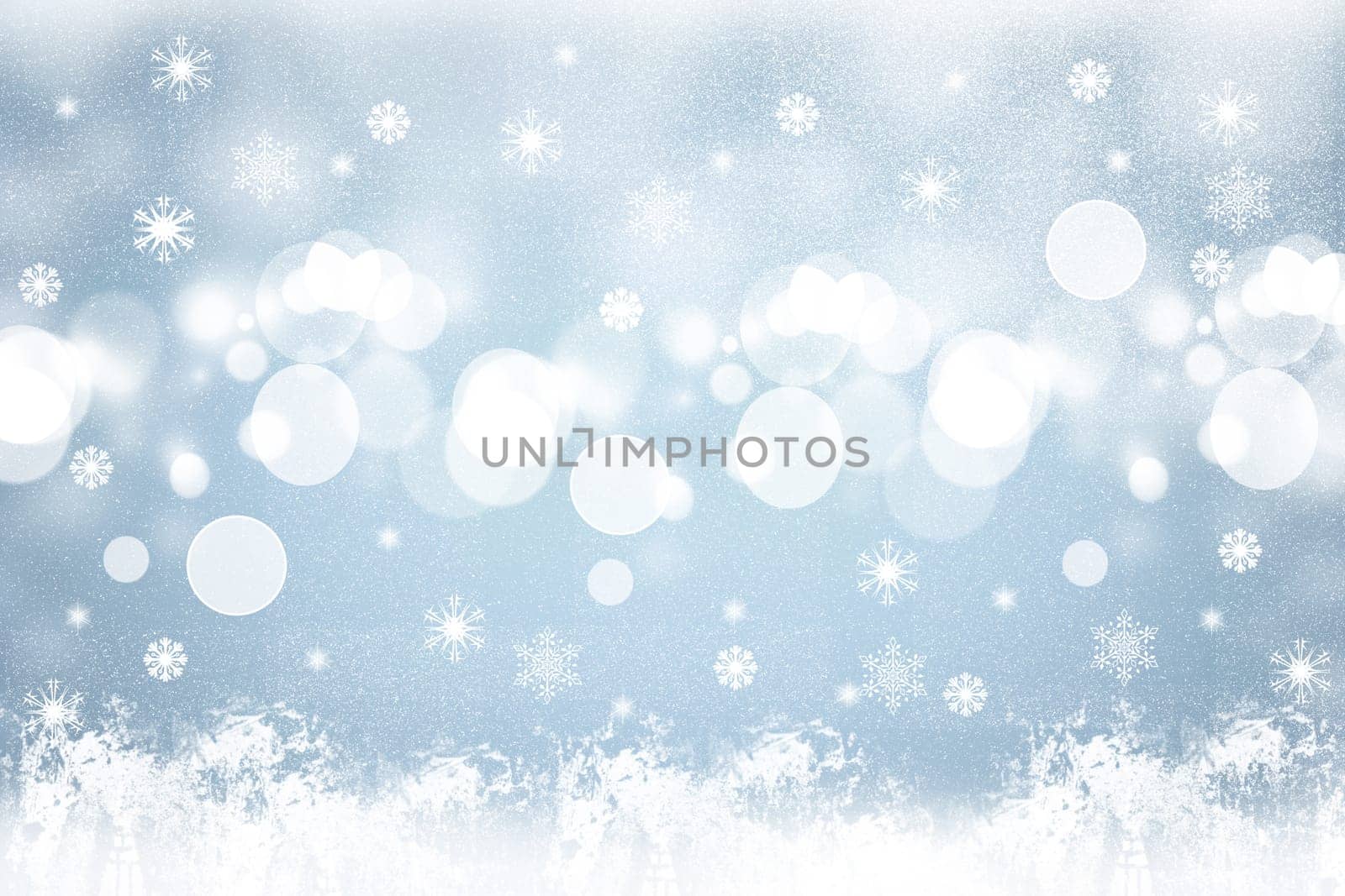 Abstract blurred festive light blue winter christmas or Happy New Year background texture with shiny blue and white bokeh lighted glittering snowflakes and stars. Space for your design. Card concept.