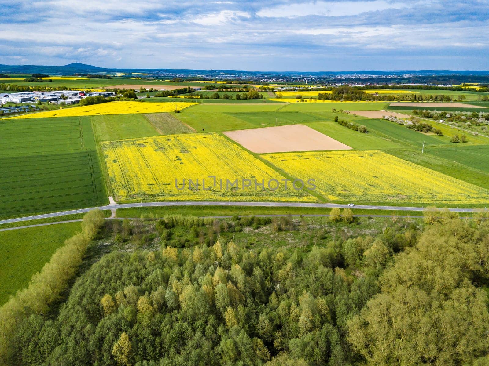 Drone shot from german landscape with meadows in Hesse.