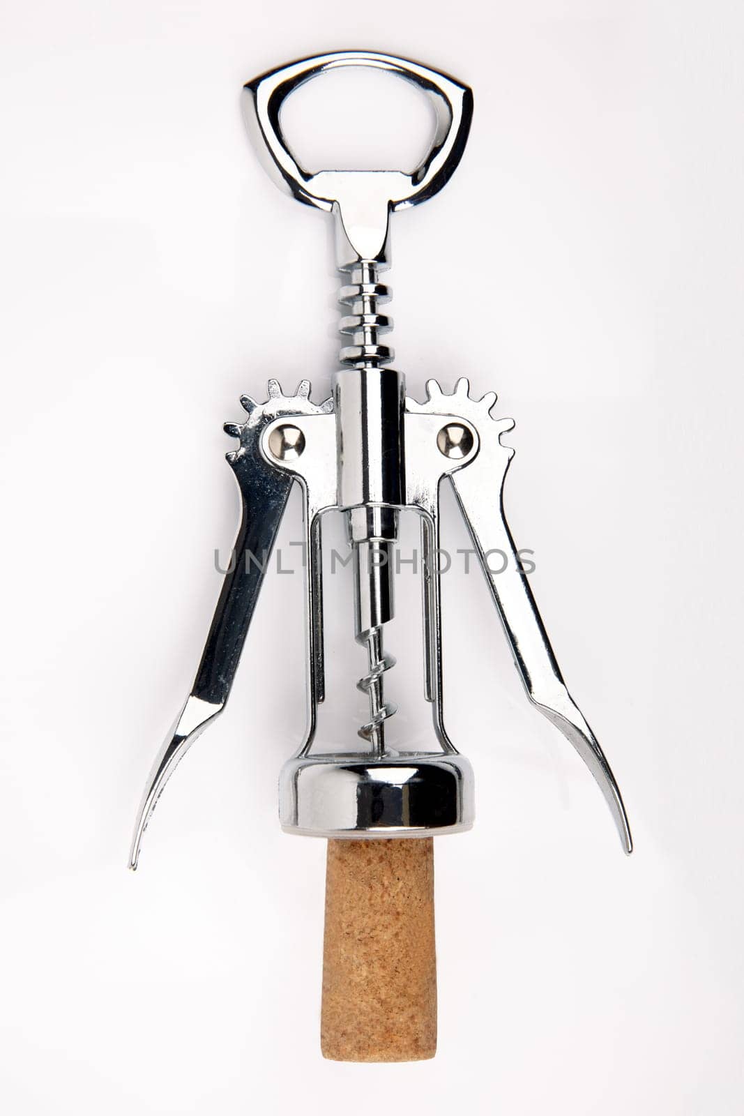 Wine opener with cork isolated over white background