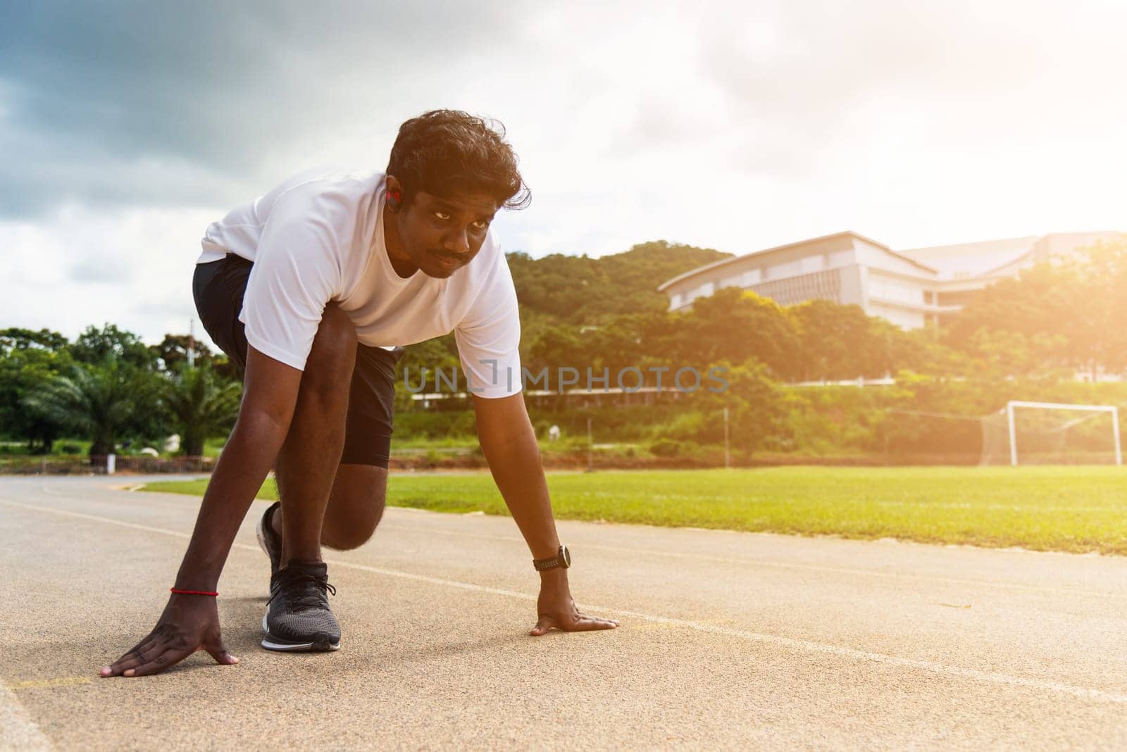 Asian young athlete sport runner black man wear feet shoe active ready to start running training at the outdoor on the treadmill for a step forward, healthy exercise workout, closeup face front