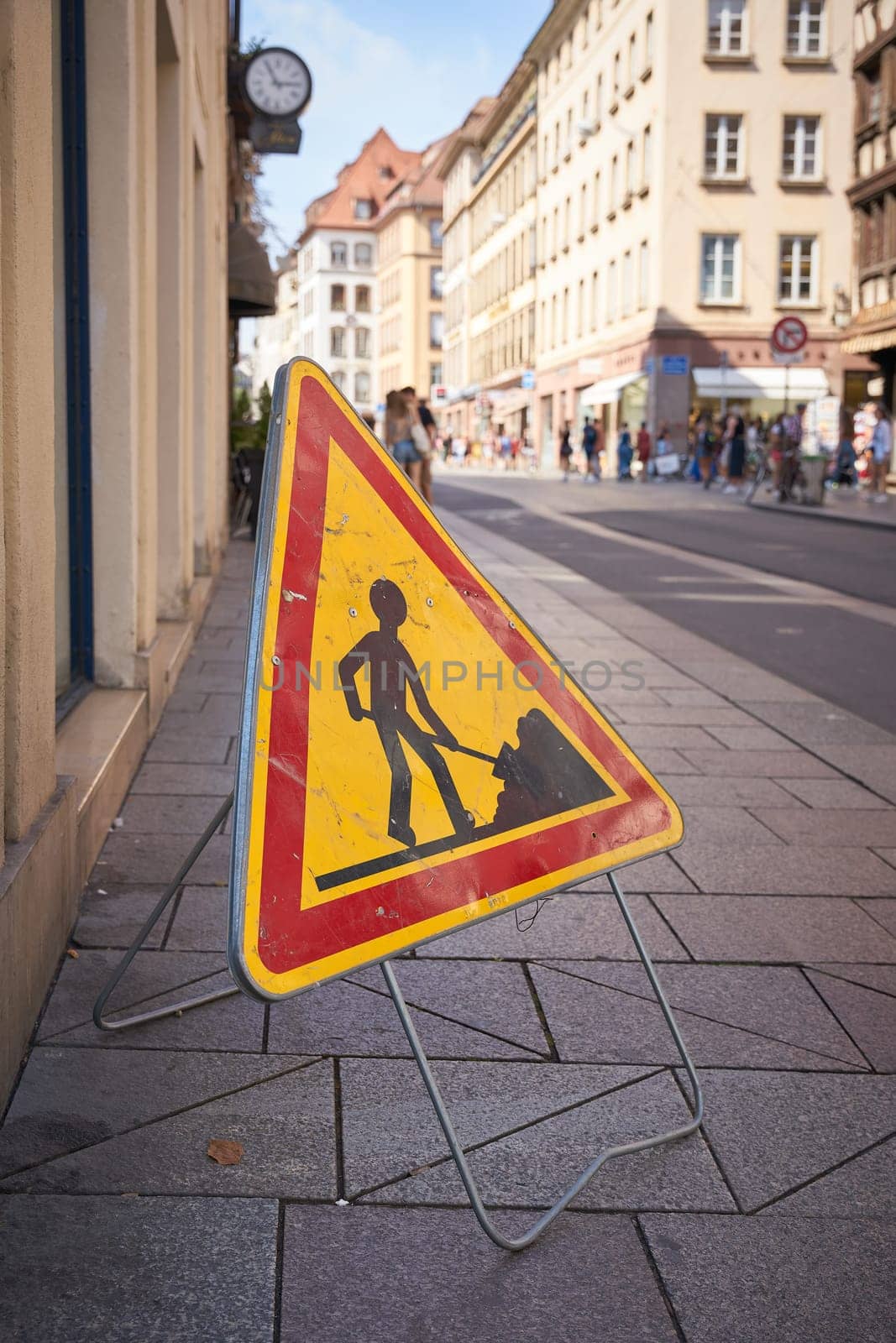 Construction site sign on a footpath in the old town of Strasbourg in France