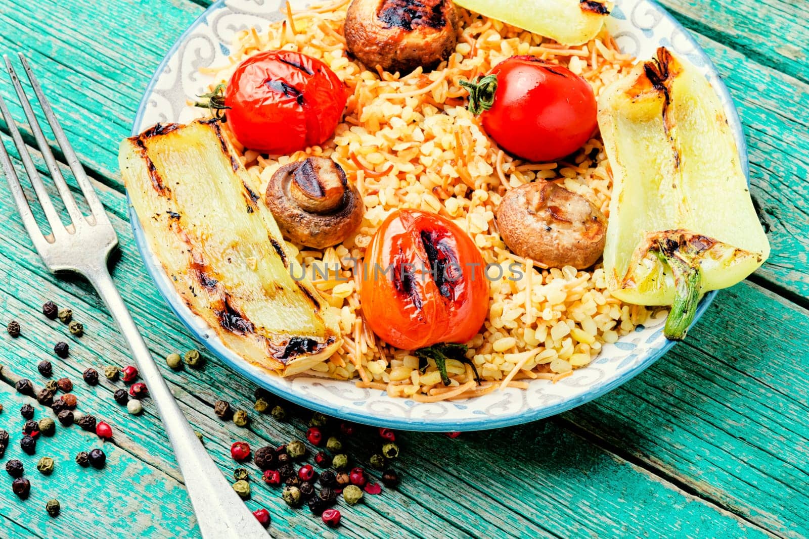 Grilled tomato, bell pepper and grilled mushroom lunch with rice for garnish
