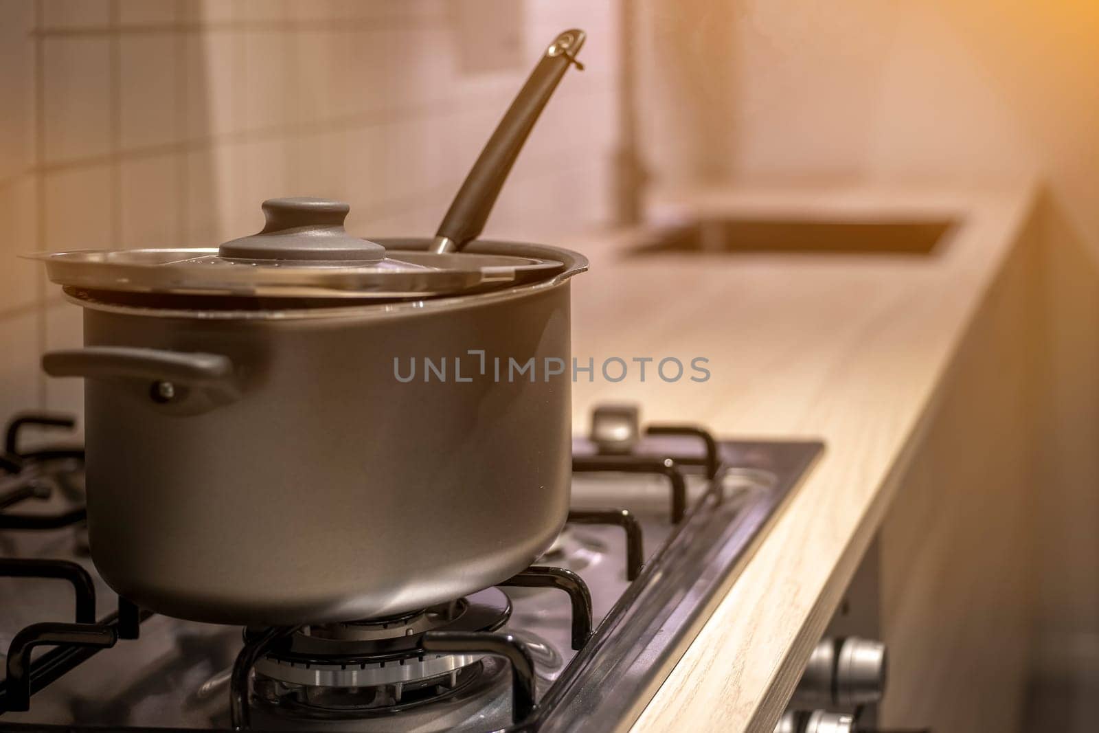 The pot is on the electric stove