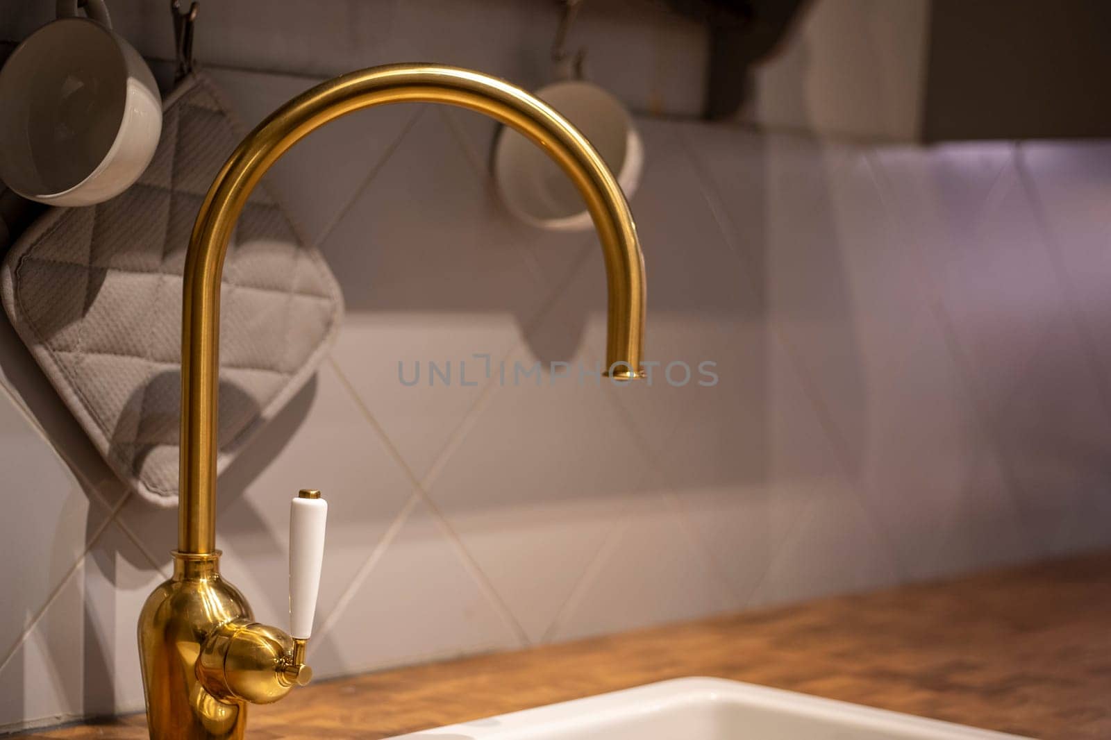 Water tap faucet in the kitchen for background