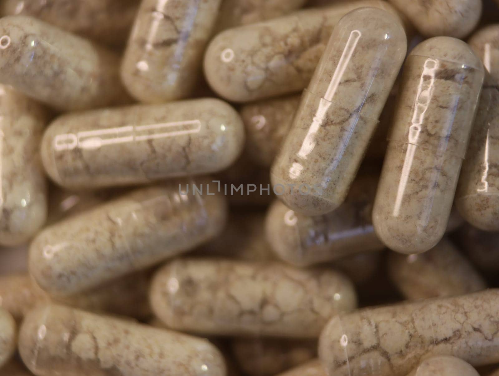 bottom with natural medicinal pills vitamins plastic container