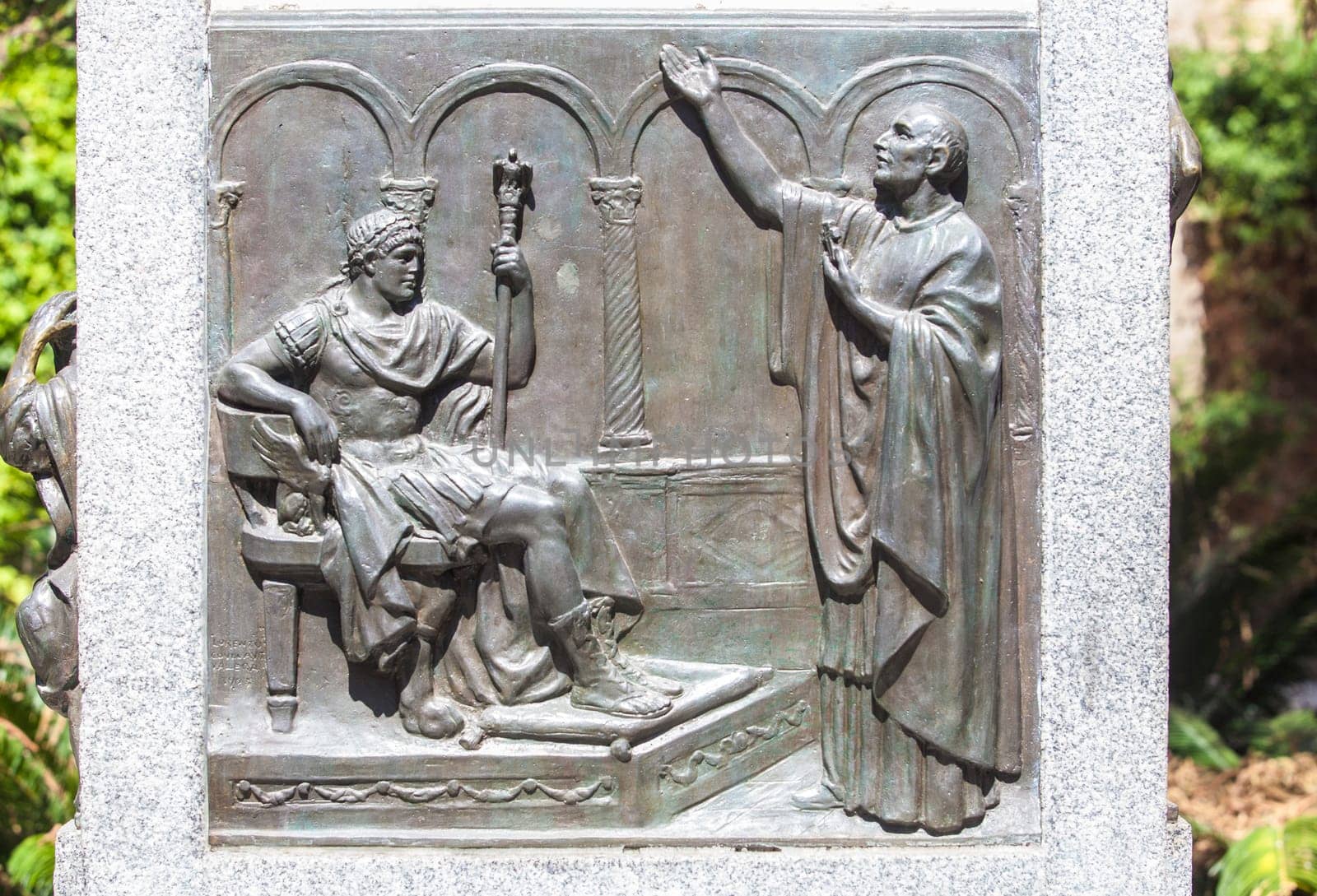 Cordoba, Spain - Sept 8th, 2020: Monument of Bishop Osio, sculptor Lorenzo Coullaut Valera, 1926. Cordoba, Spain. Biography bas-reliefs