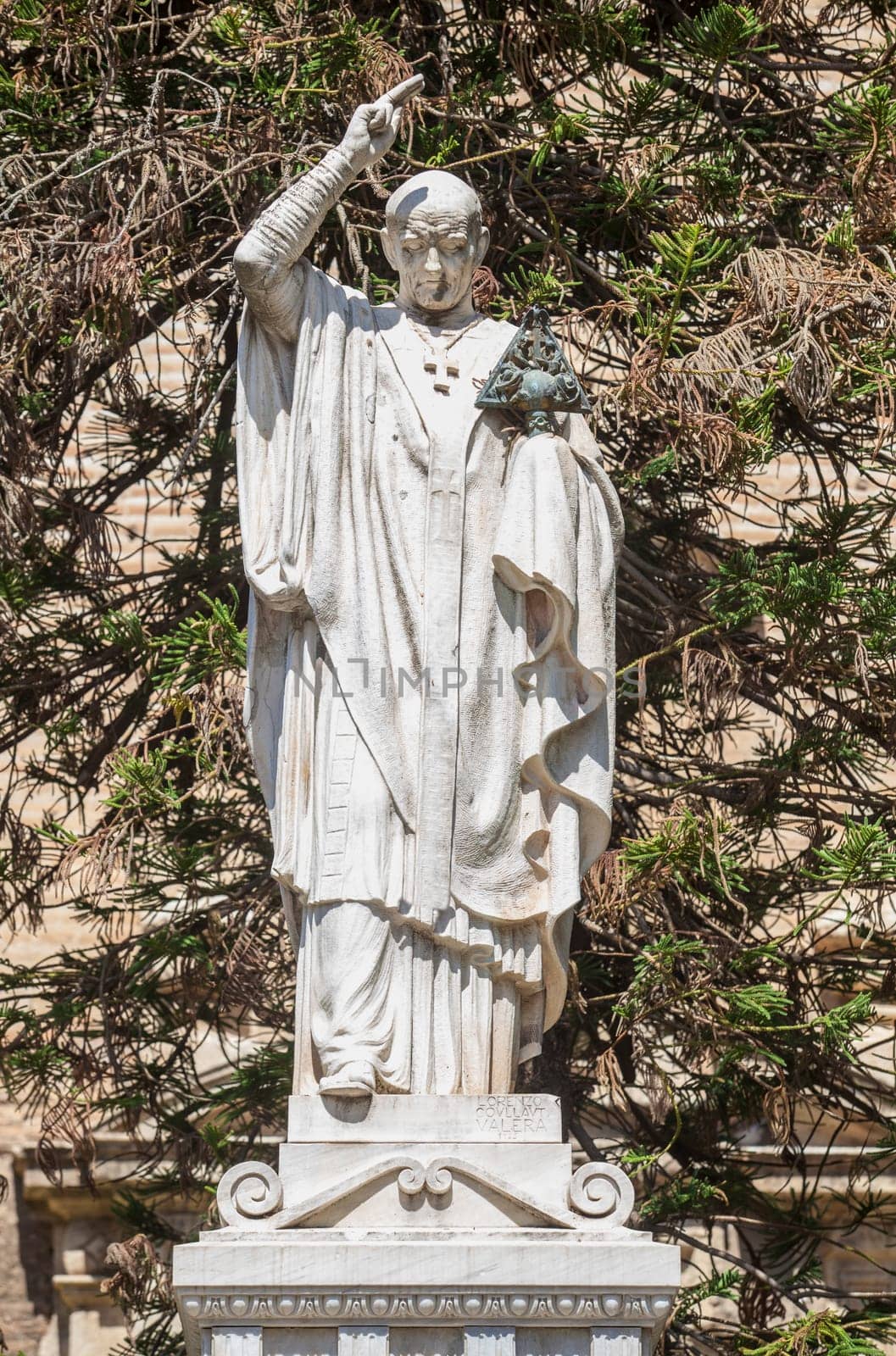 Cordoba, Spain - Sept 8th, 2020: Monument of Bishop Osio, sculptor Lorenzo Coullaut Valera, 1926. Cordoba, Spain. Statue