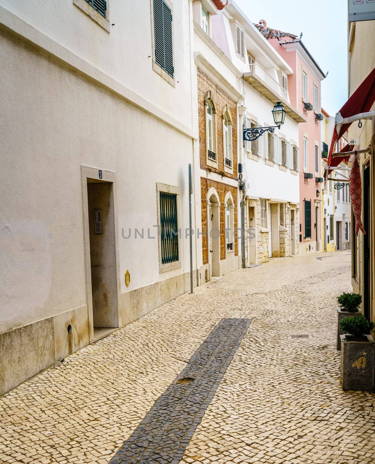 Pedestrian cobblestone street in Cascais, Portugal