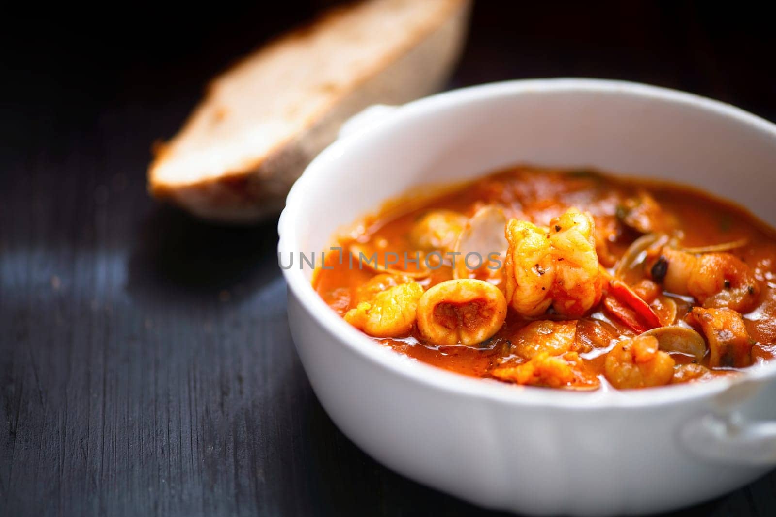 rustic italian seafood soup in garlicky tomato sauce