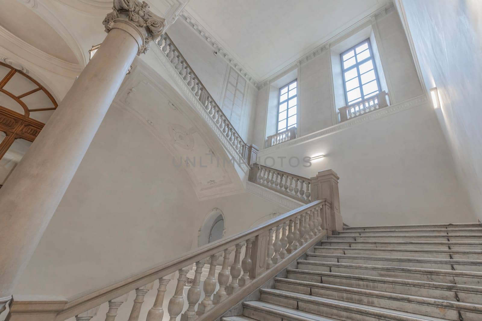 TURIN, ITALY - CIRCA MAY 2021: luxury staircase made of marble in an antique Italian palace