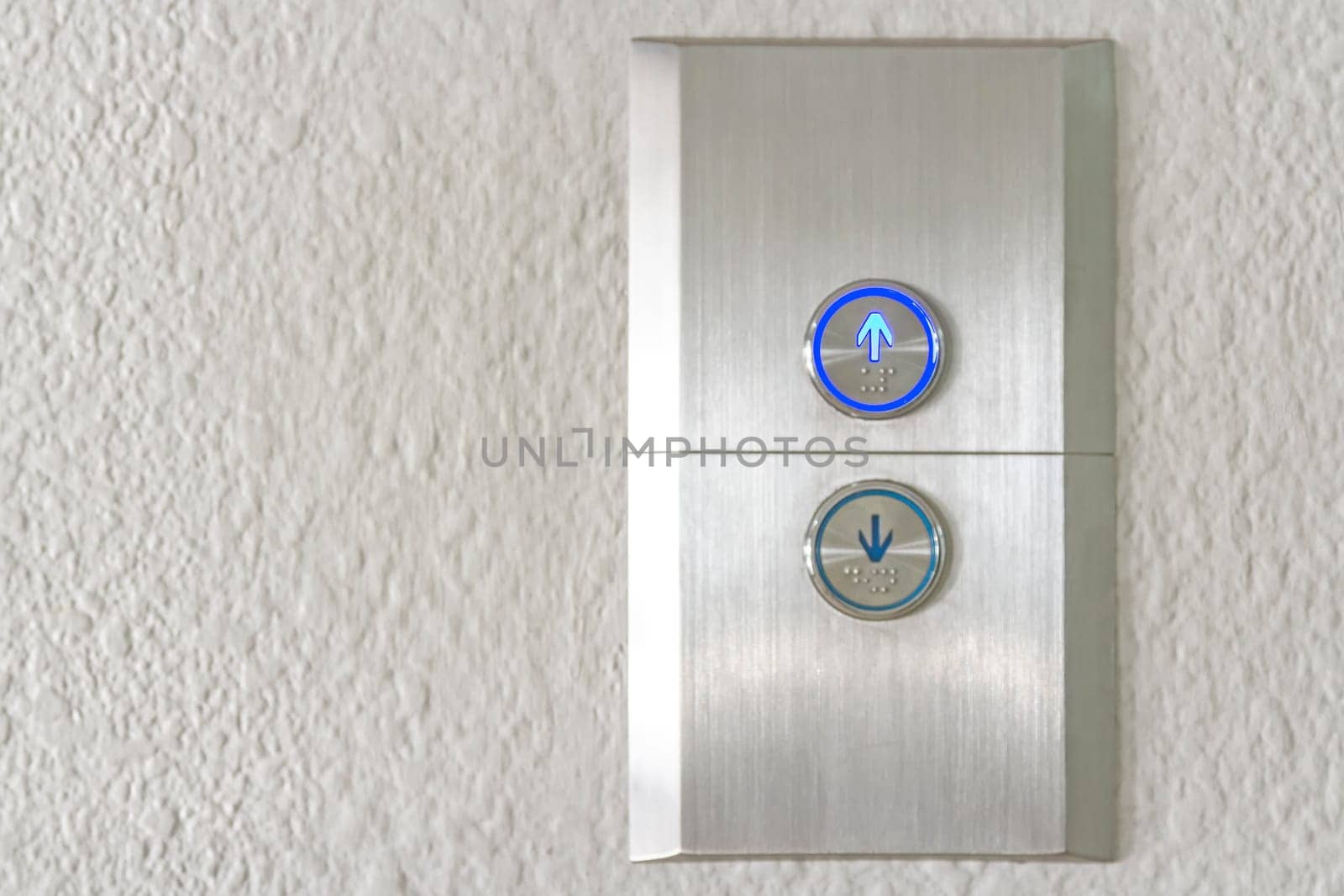Press the elevator up and keypad elevator
