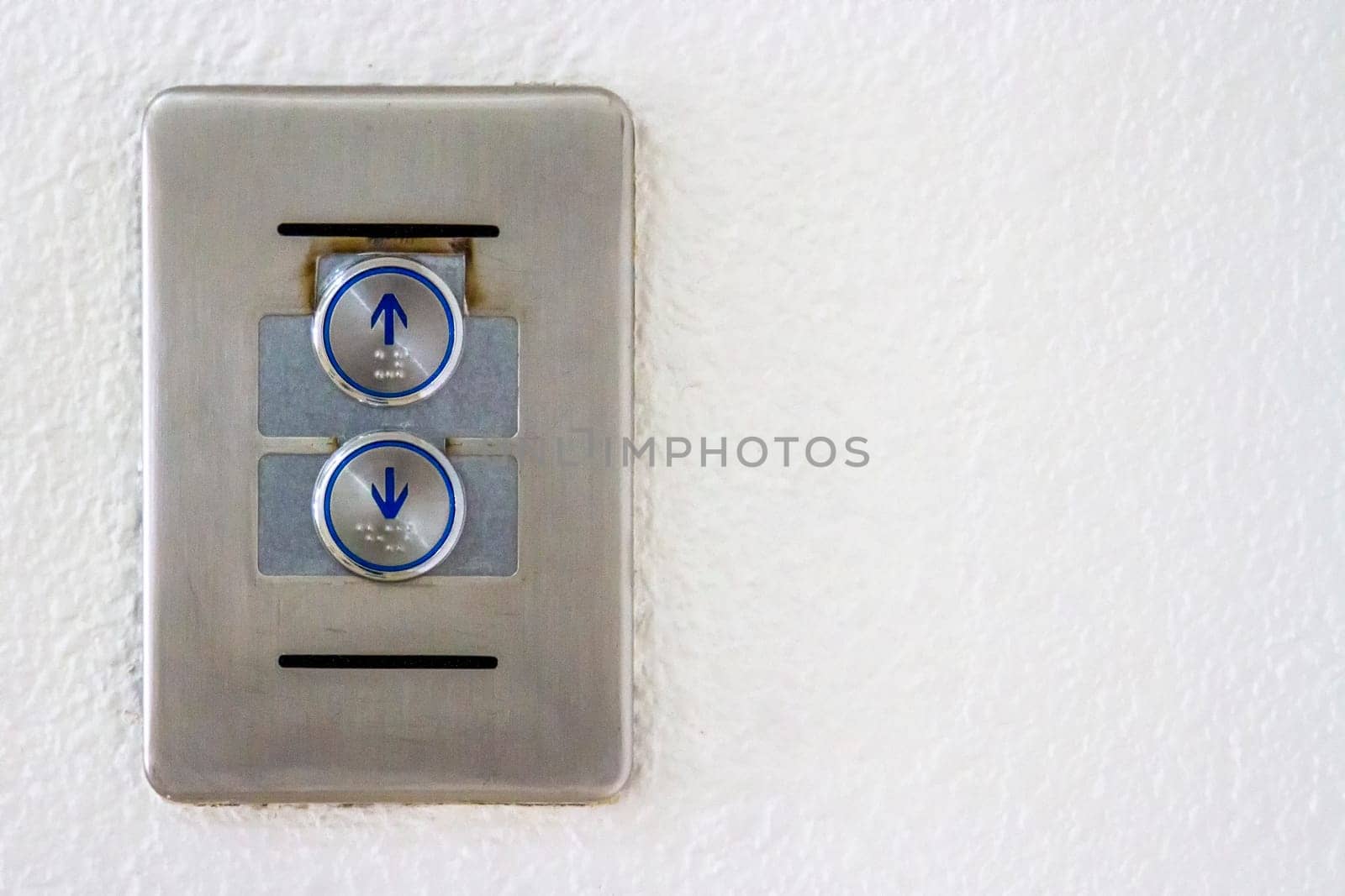 Press the elevator up and keypad elevator
